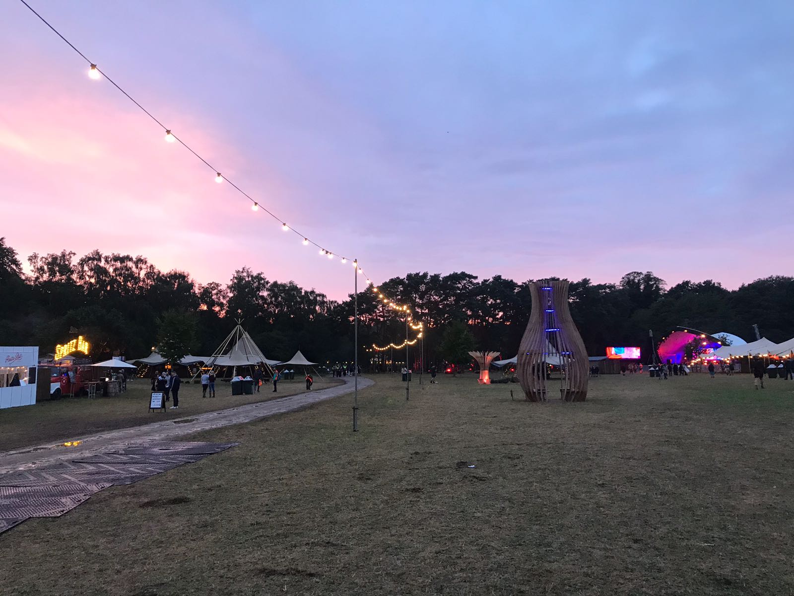 The sun rises over the entrance to the Houghton Festival arena. Image: Tom Jenkins