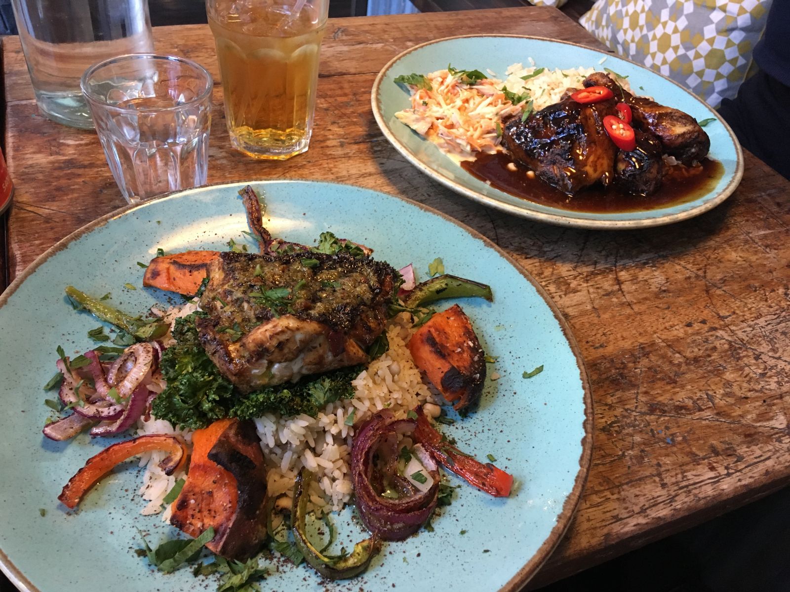 Calypso Kitchen mains: The Jerk Red Snapper and Jerk Chicken.