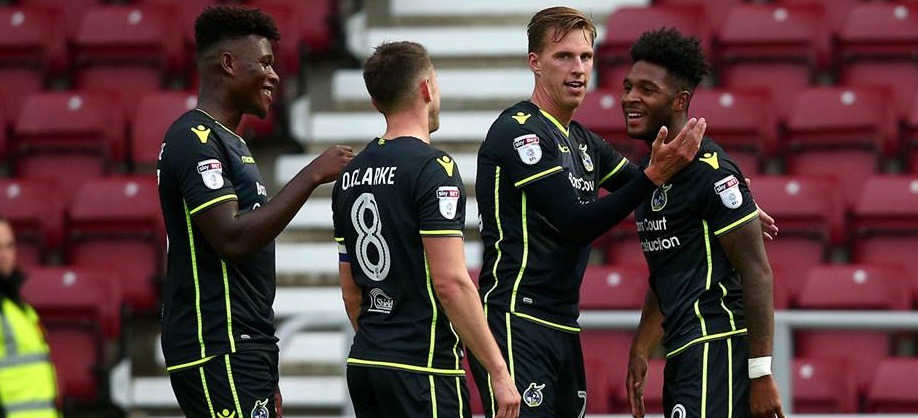 Rovers celebrate scoring during their 6-0 win away to Northampton
