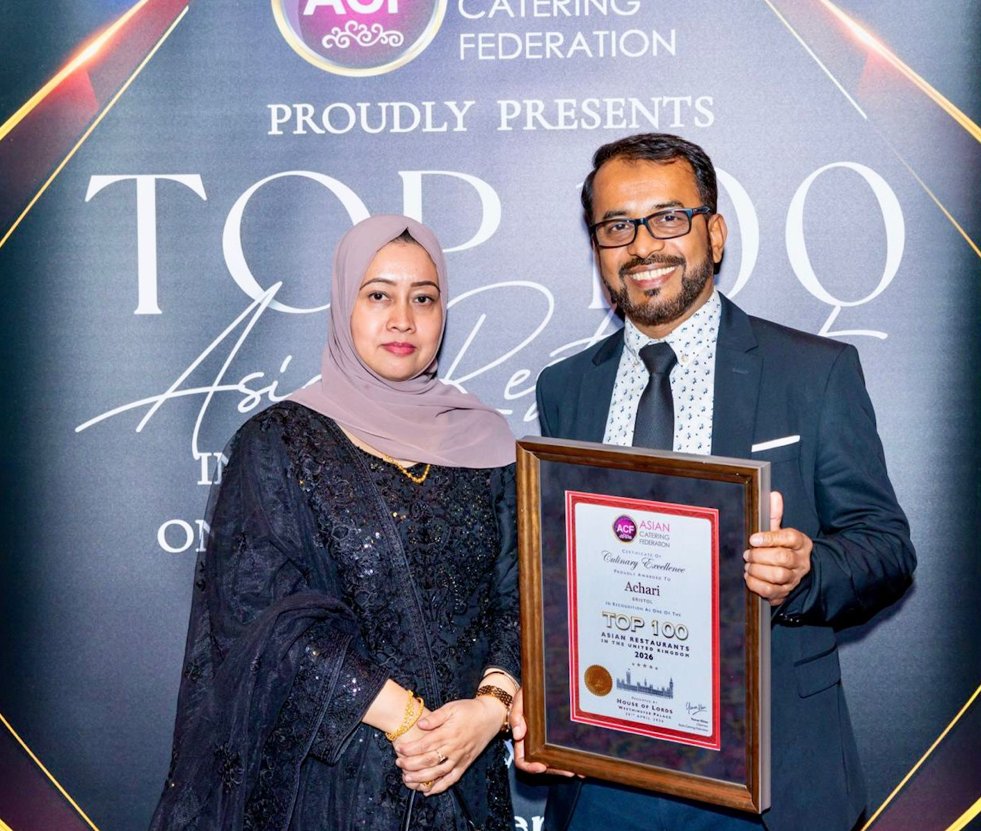 Kam from Achari Indian Kitchen in Bristol accepting award for 2026