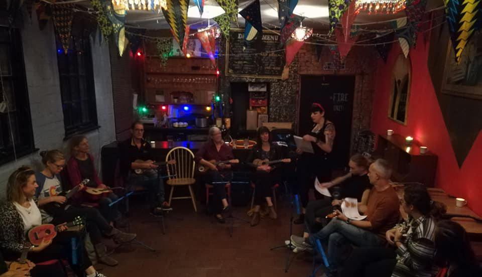 A ukulele workshop downstairs at The Cloak & Dagger.