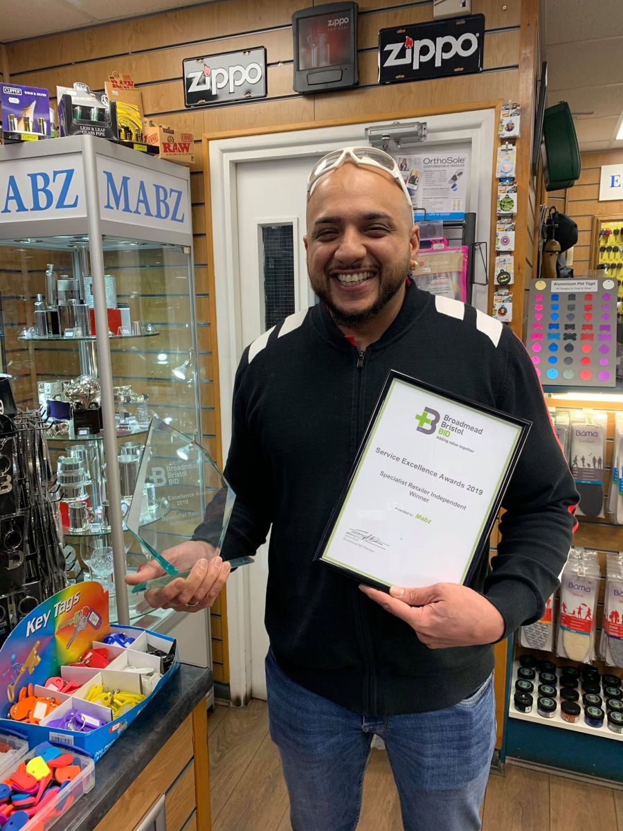 Mabz with his Best Customer Service Award.